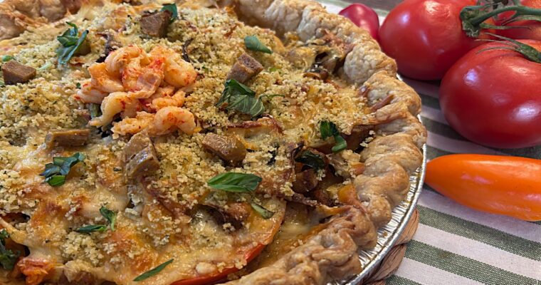 Creole Tomato Basil Pie with Crawfish and Andoullie Sausage